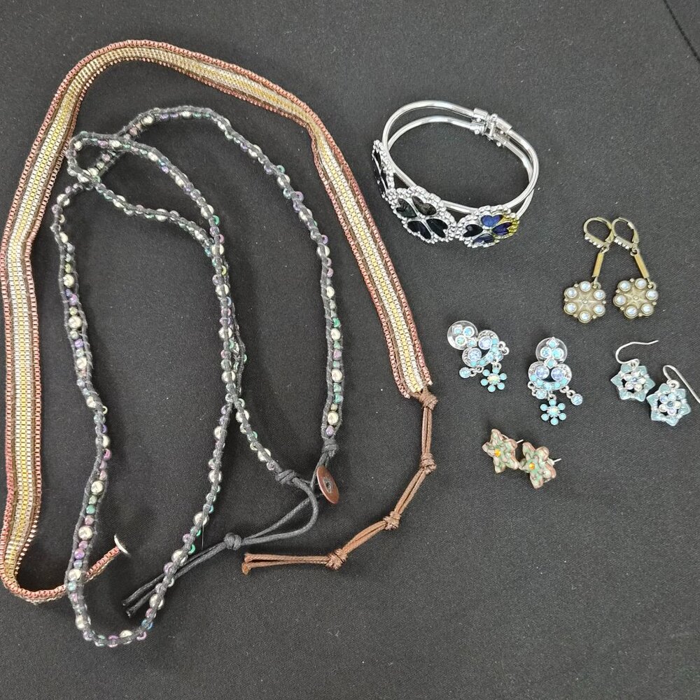 Lot of avant garde costume jewelry two necklaces, 4 pairs earrings, one bracelet